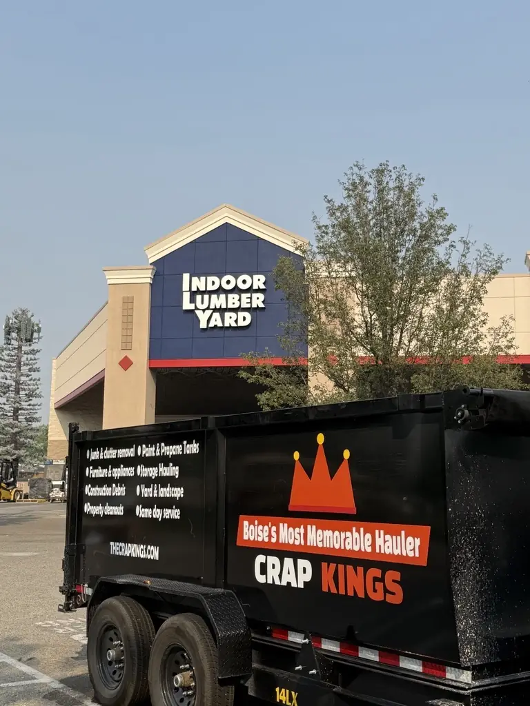 Crap Kings branded dump trailer on a Boise junk removal job